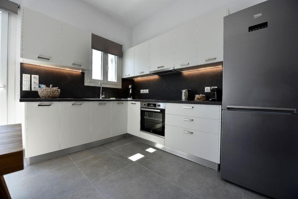 Kryni Deluxe Houses Adámasz Kültér fotó